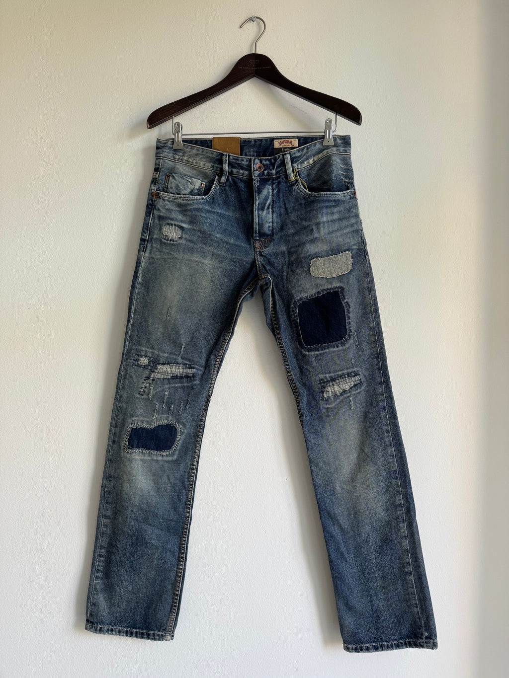 SEWN & DISTRESSED PATCHWORK JEANS