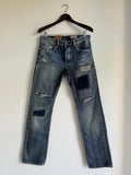 SEWN & DISTRESSED PATCHWORK JEANS