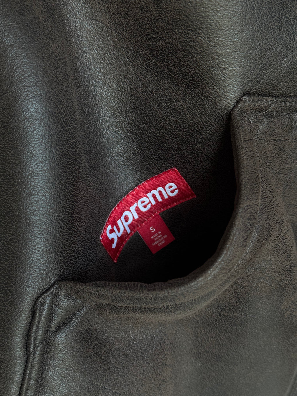 SUPREME REVERSIBLE FAUX SHEARLING VEST