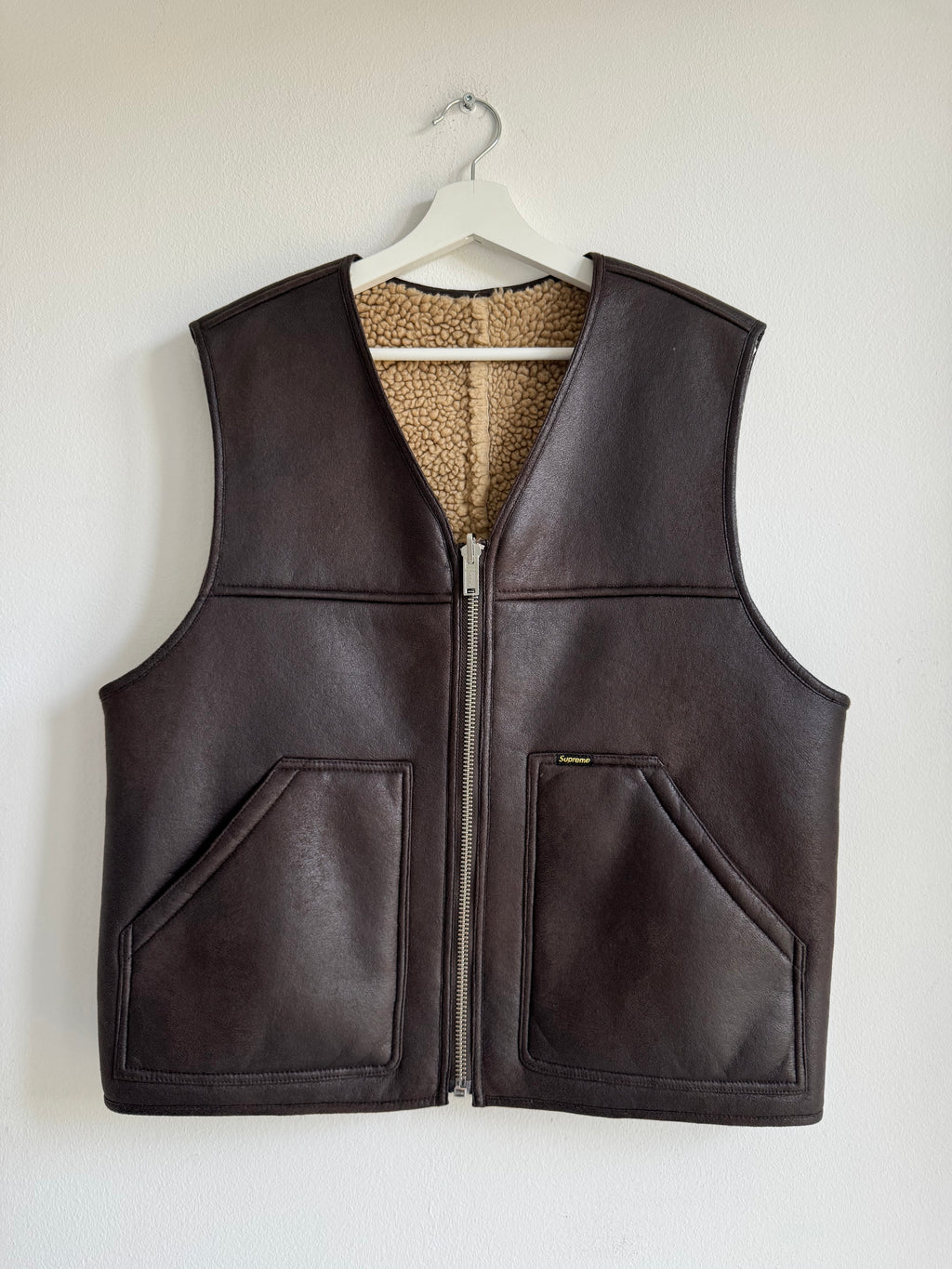 SUPREME REVERSIBLE FAUX SHEARLING VEST