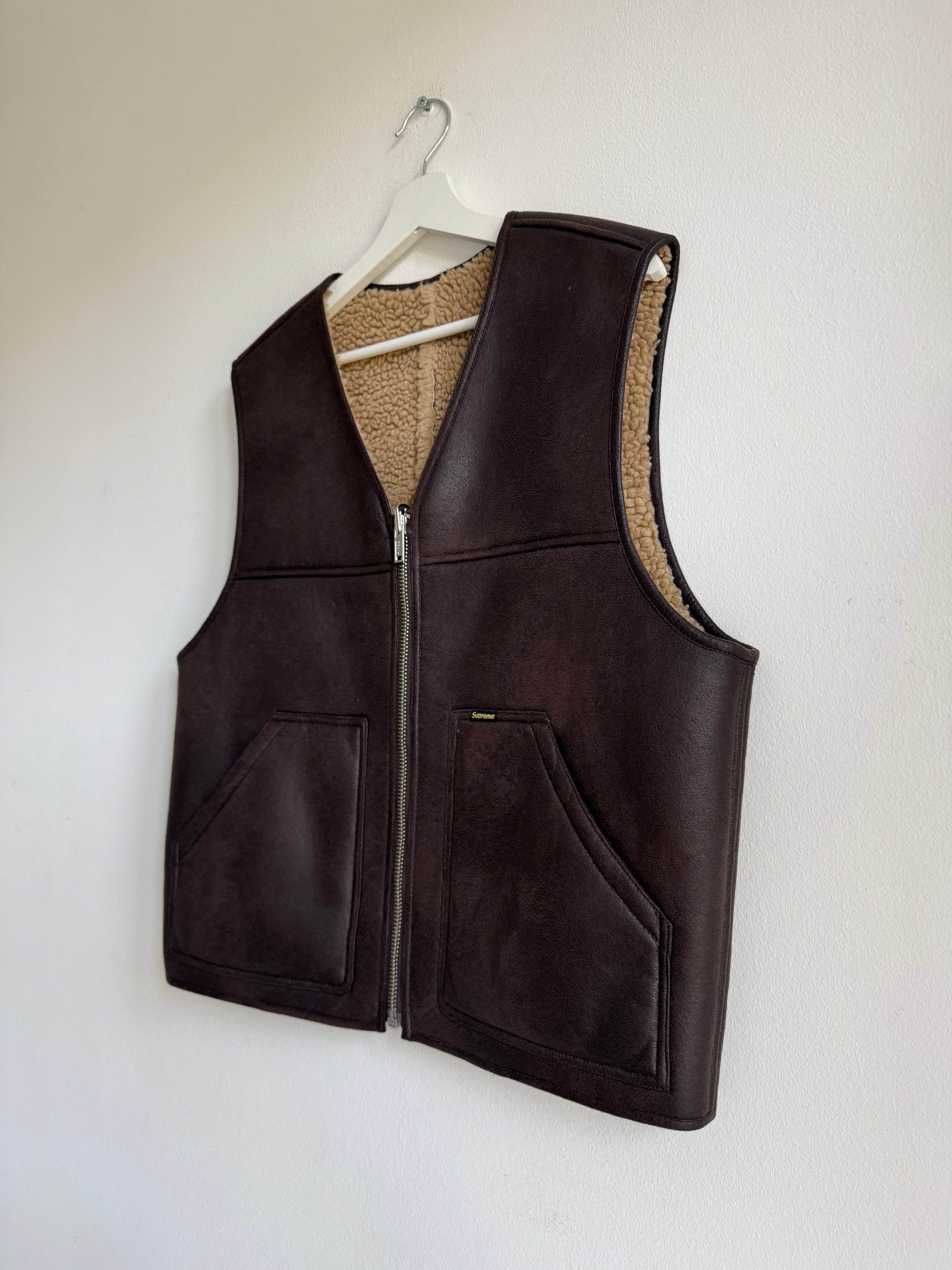 SUPREME REVERSIBLE FAUX SHEARLING VEST