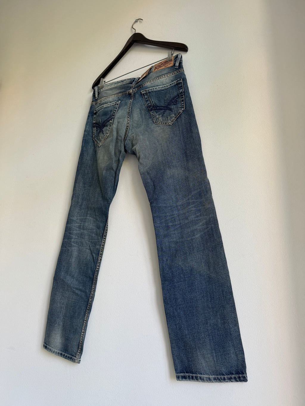 SEWN & DISTRESSED PATCHWORK JEANS