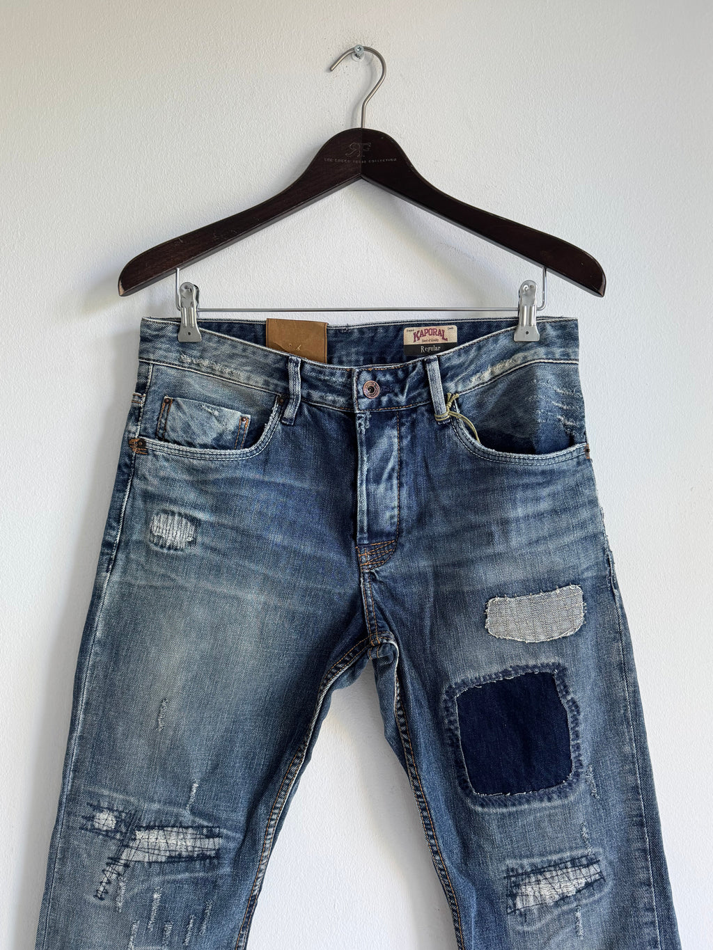 SEWN & DISTRESSED PATCHWORK JEANS