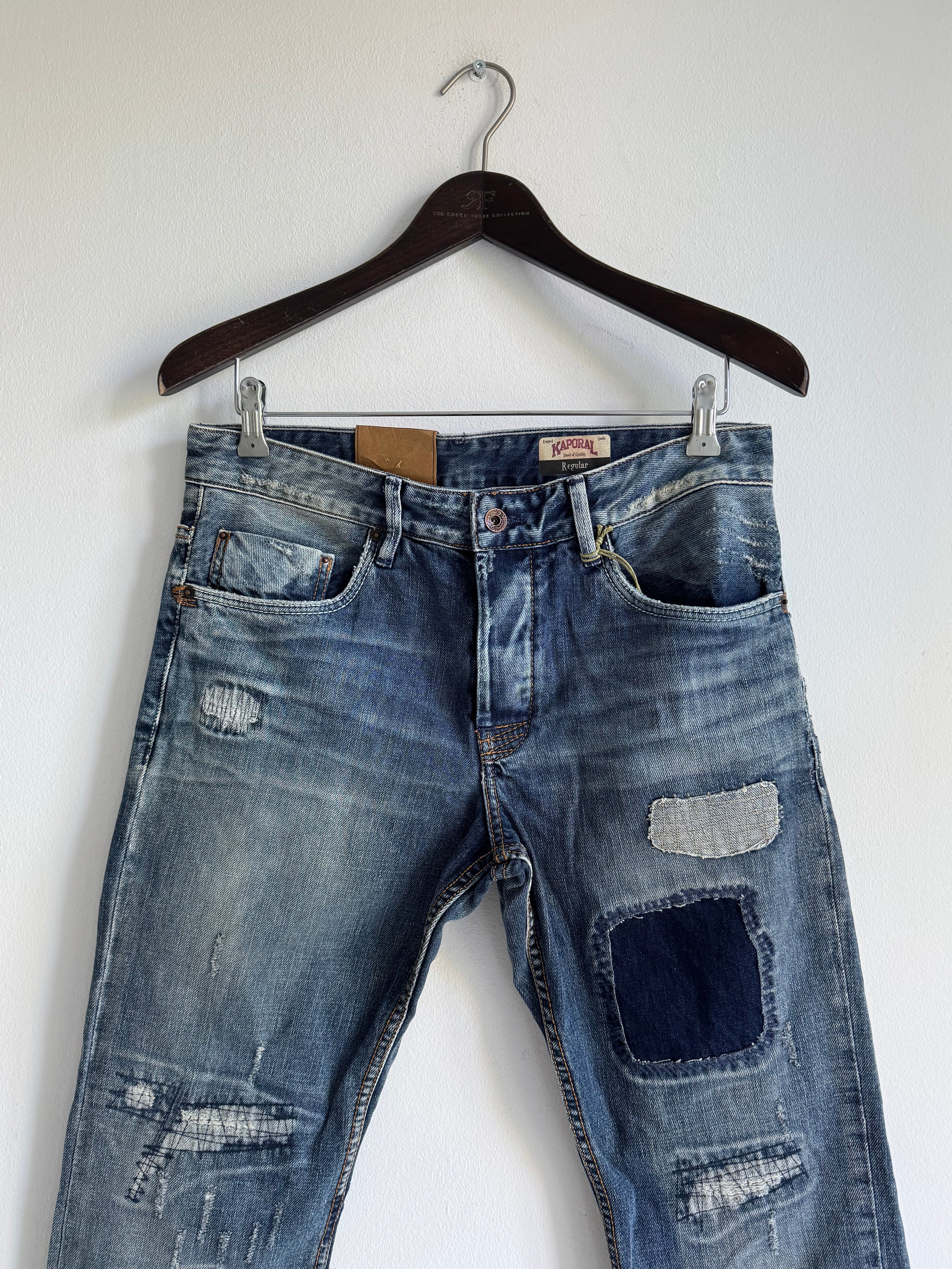 SEWN & DISTRESSED PATCHWORK JEANS